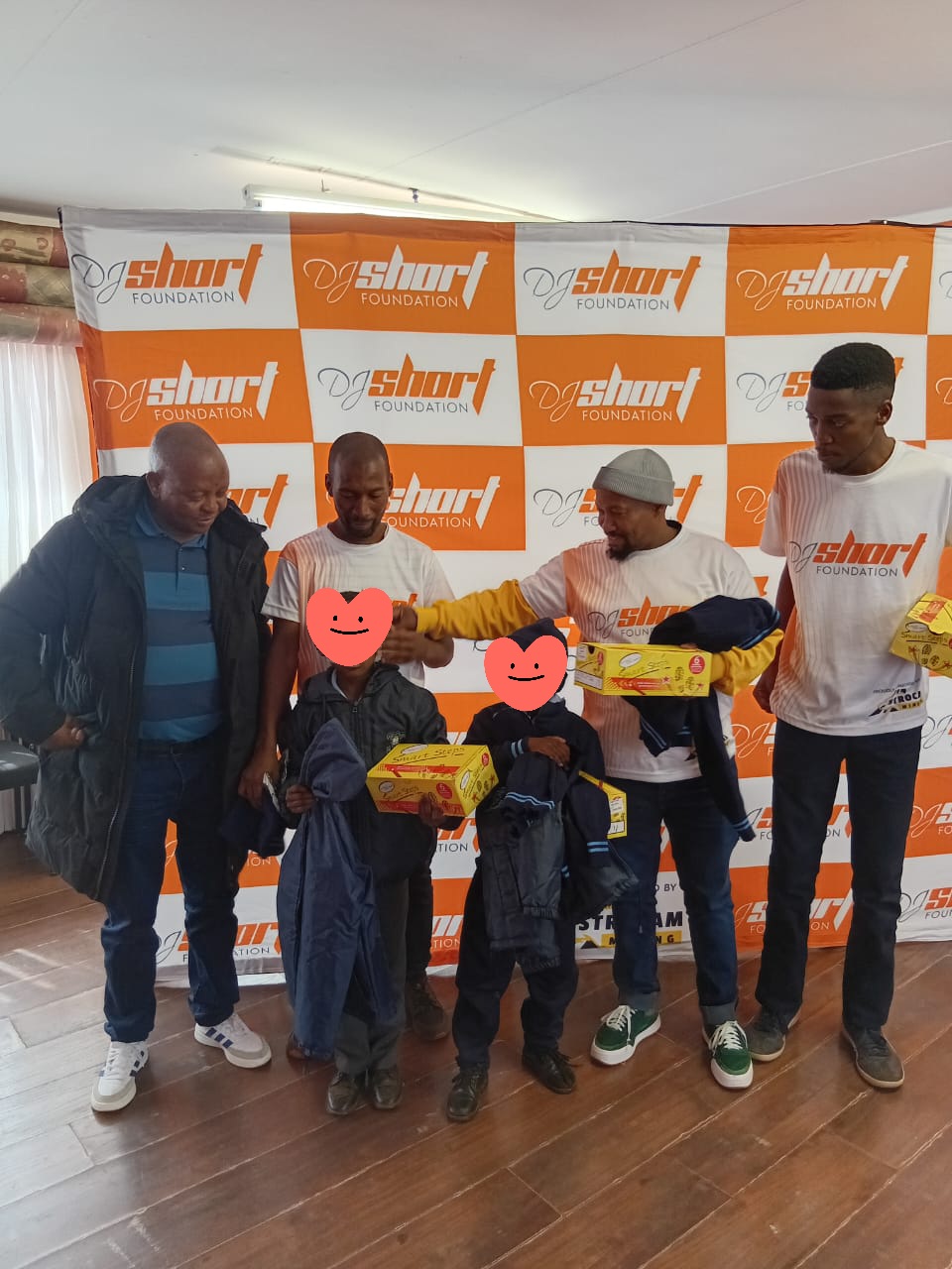Young learners receiving uniforms and Smart Steps shoes at Hlanganani Primary School