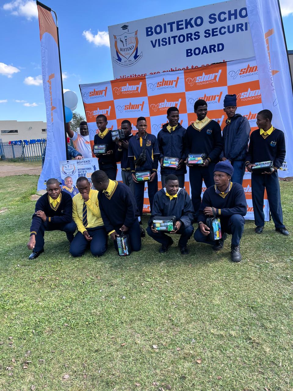 Learners receiving educational hampers from DJ Short Foundation at Boiteko School